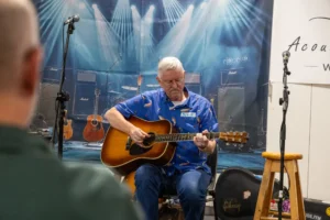 Participant performing during the Saturday night open mic session